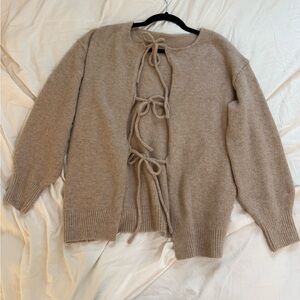 Beige Cardigan with Bow Details